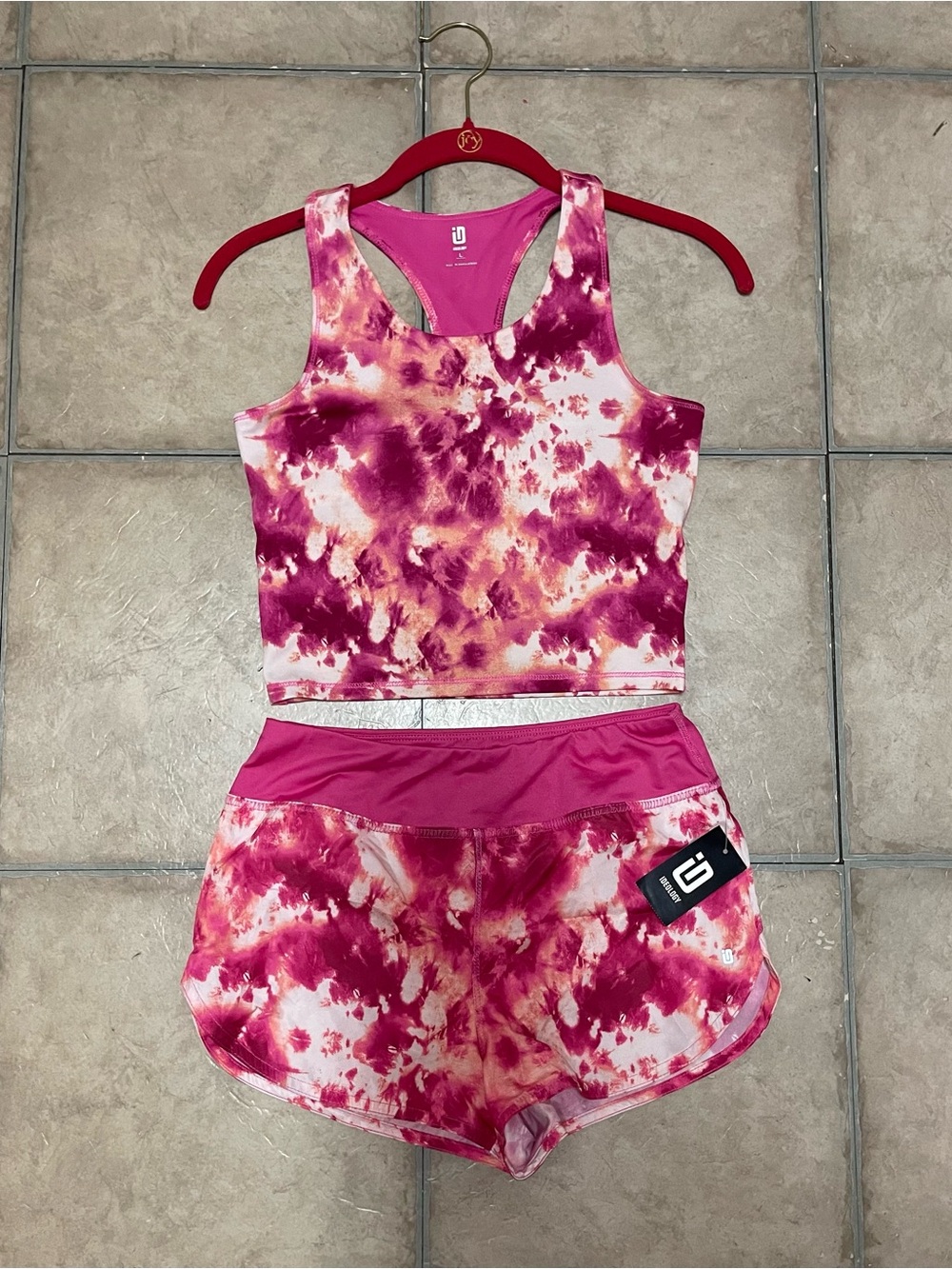 Ideology girls' pink tie-dye longline sports bra and shorts matching set.